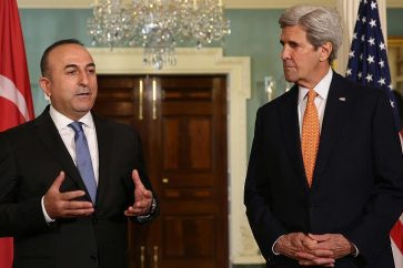 US Secretary of State John Kerry meets his Turkish counterpart Mevlut Cavusoglu during the G20 summit in China