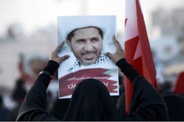 Protestor Raising Sheikh Salman's Photo