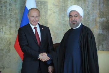Iranian President Sheikh Hassan Rouhani (L) and his Russian counterpart Vladimir Putin (R)