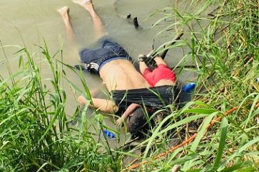 ADDS THAT PHOTO WAS FIRST PUBLISHED IN MEXICAN NEWSPAPER LA JORNADA - EDS NOTE: GRAPHIC CONTENT - The bodies of Salvadoran migrant Oscar Alberto Martínez Ramírez and his nearly 2-year-old daughter Valeria lie on the bank of the Rio Grande in Matamoros, Mexico, Monday, June 24, 2019, after they drowned trying to cross the river to Brownsville, Texas. Martinez' wife, Tania told Mexican authorities she watched her husband and child disappear in the strong current. This photograph was first published in the Mexican newspaper La Jornada. (AP Photo/Julia Le Duc)