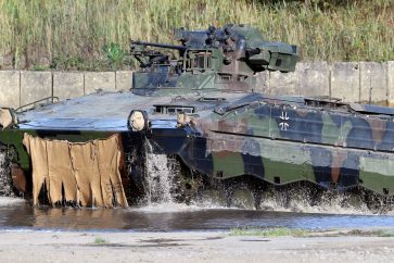FILE PHOTO: A Marder armoured infantry fighting vehicle of the German army Bundeswehr takes part in an exercise during a media day in Munster, Germany, September 28, 2018. REUTERS/Fabian Bimmer/File Photo