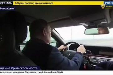 Russian President Vladimir Putin driving over the bridge to Crimea