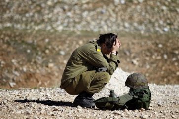 An Israeli female soldier appears in distress during a military exercise (photo from archive).