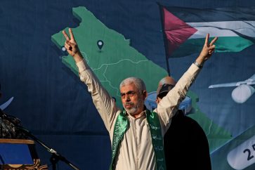 (FILES) Yahya Sinwar, leader of the Palestinian Hamas movement in the Gaza Strip, gestures on stage during a rally in Gaza City on May 24, 2021. Israel's foreign minister has called to "swiftly eliminate" Yahya Sinwar, who was appointed by Hamas on August 6, 2024 as the militant group's new political leader replacing Ismail Haniyeh who was killed in Tehran last week. (Photo by MAHMUD HAMS / AFP)